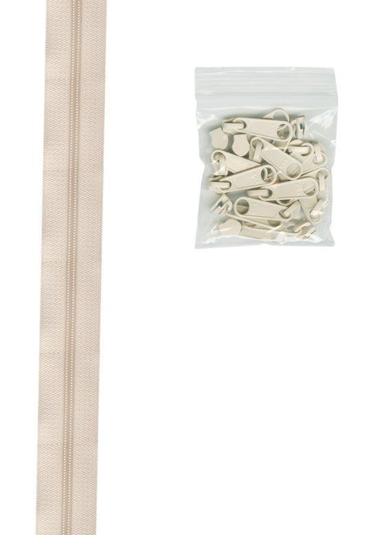 4 yards of 16mm #4.5 zipper chain and 16 Extra-Large Coordinated Pulls Ivory